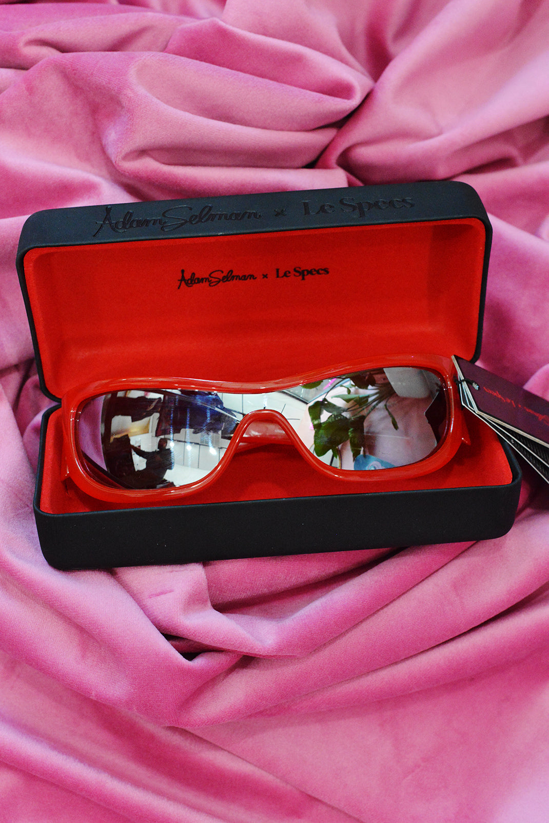 Adam Selman red sunglasses