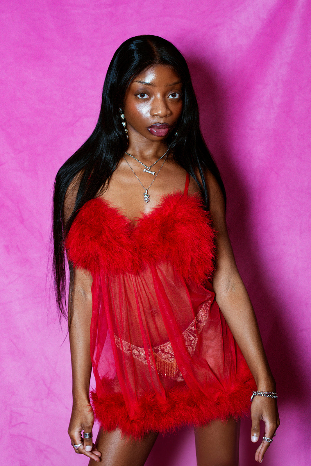 FREDERICK'S OF HOLLYWOOD red slip with feather